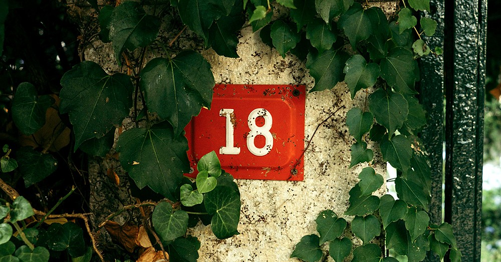 An ivy-covered villa, number 18